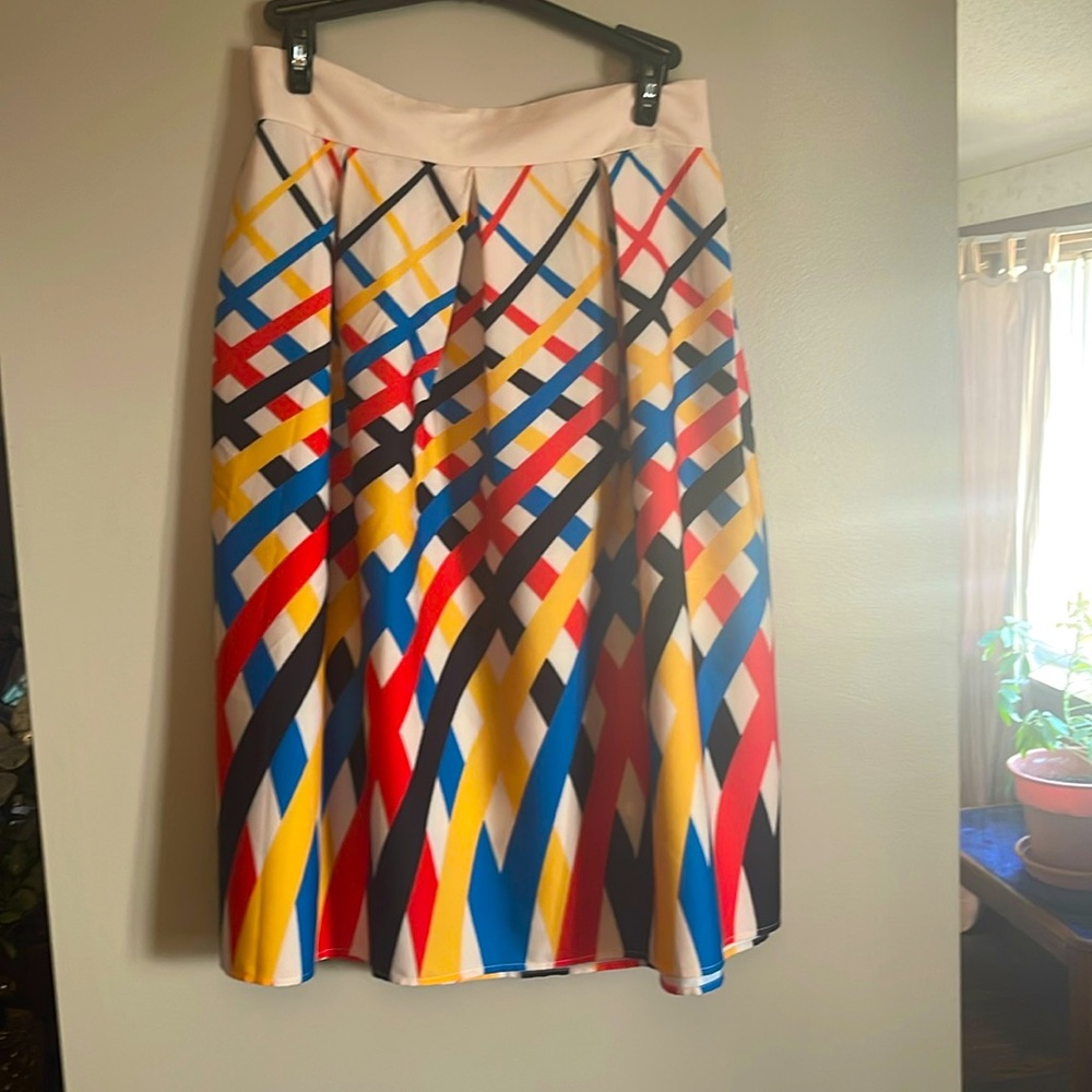 Polyester skirt.  Sz 12.  Wore once.  Bought from Retro Vintage website.